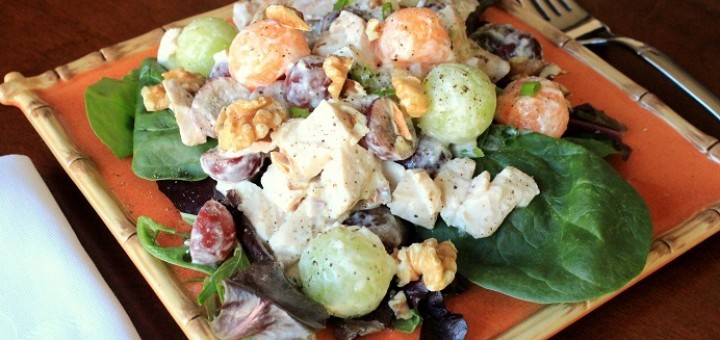 Chicken & Sweet Melon Salad with Grapes and Walnuts on a Bed of Mixed Greens