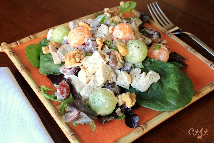 Chicken & Sweet Melon Salad with Grapes and Walnuts on a Bed of Mixed Greens