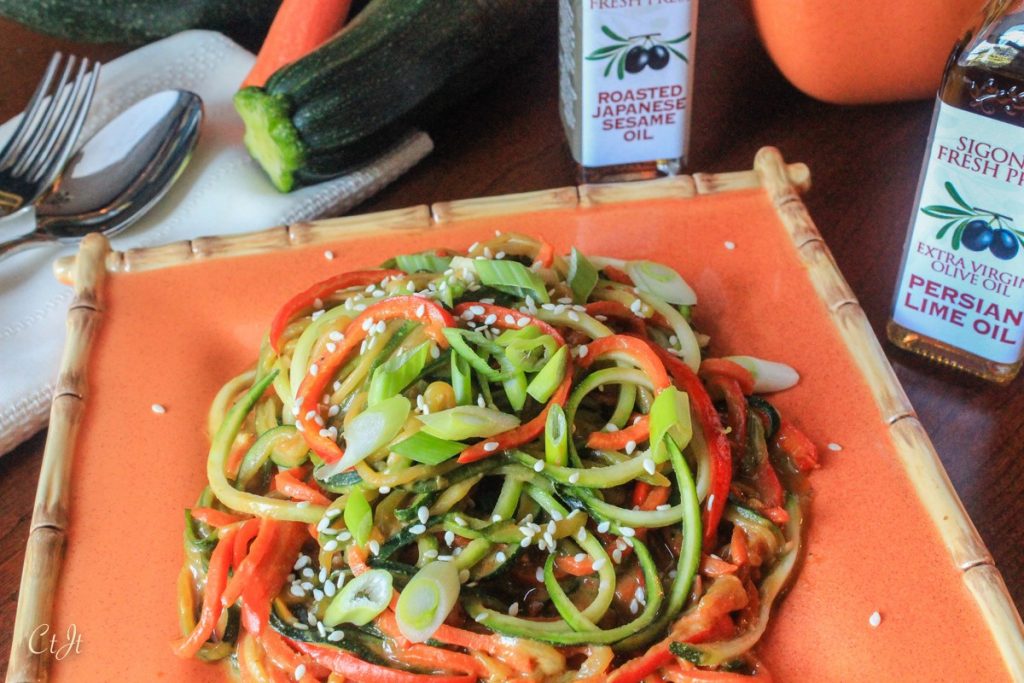 Thai Peanut Zoodles with Carrot and Bell Pepper featuring Sigona's Persian Lime Olive Oil, a gluten-free dish.