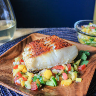Wild white sea bass with summer salsa featuring pineapple