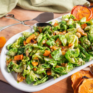 Sautéed Brussels Sprout Leaves with Persimmons, Heirloom Apricots and Walnuts