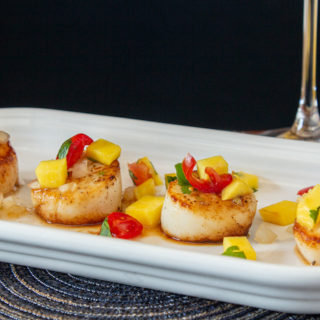 Seared scallops with a mango balsamic salsa