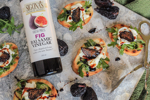 Tuscan Herb Toasts with Chèvre, Arugula and a Fig Balsamic Reduction