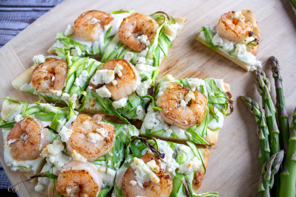 Shaved asparagus flatbread with herbed cheese and wild Patagonian shrimp