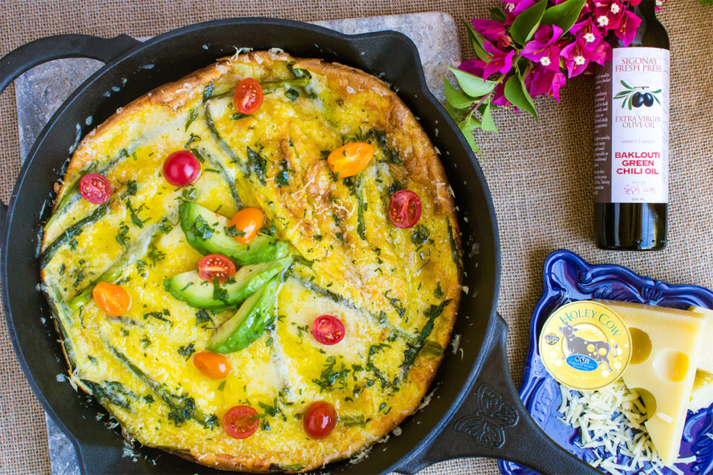 Holey Cow Cheese & Asparagus Popover with Spicy Baklouti Oil