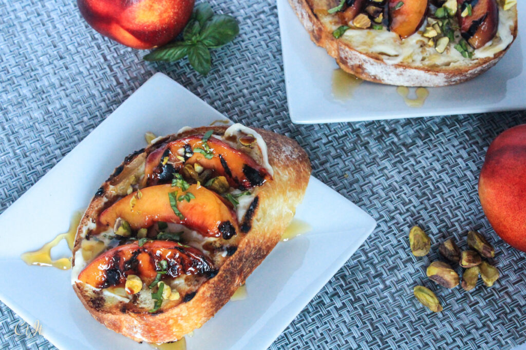 Grilled Nectarine Bruschetta with Honey Mascarpone, Pistachios and Basil