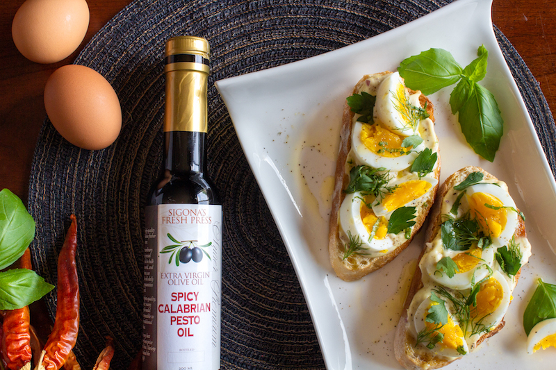 Fresh Herb and Egg Salad on Toast with Sigona’s Calabrian Pepper Pesto Olive Oil 