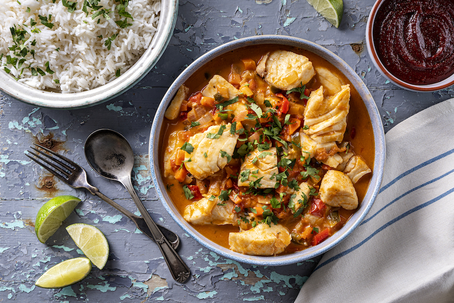 Poached Ling Cod in Tomato Curry with Sigona's Spicy Calabrian Pesto Olive Oil