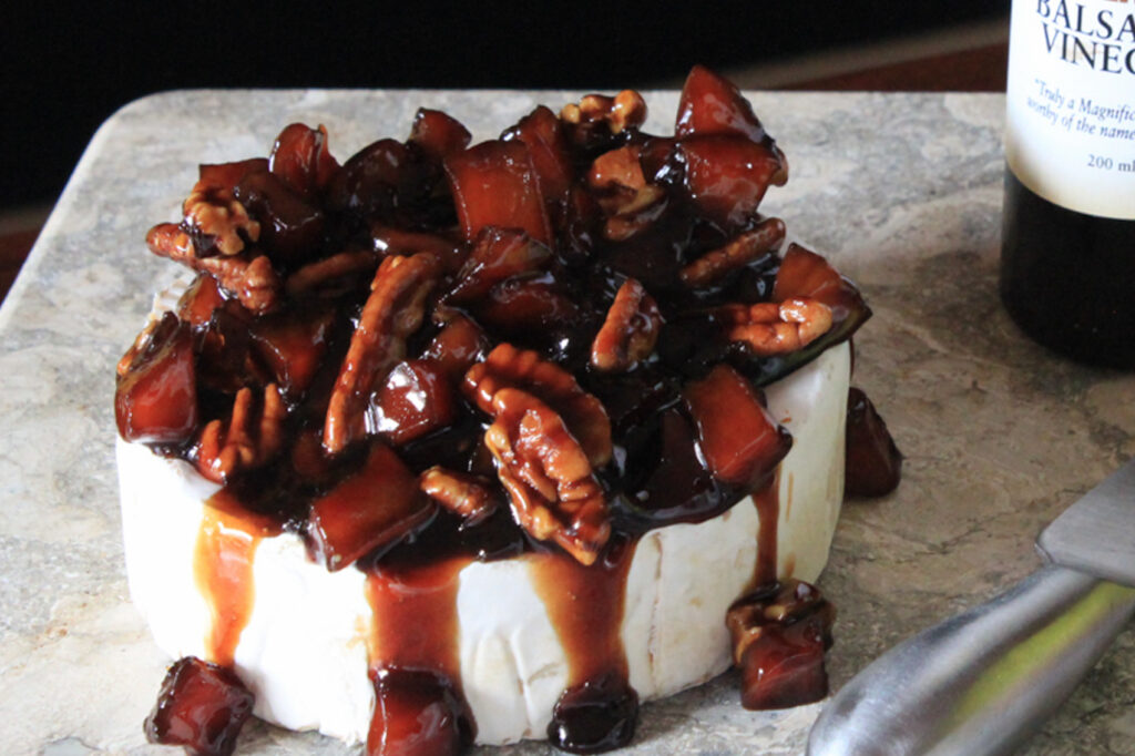Warmed Brie with Caramelized Cinnamon Pear & Pecan Compote