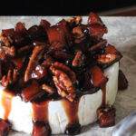 Warmed Brie with Caramelized Cinnamon Pear & Pecan Compote